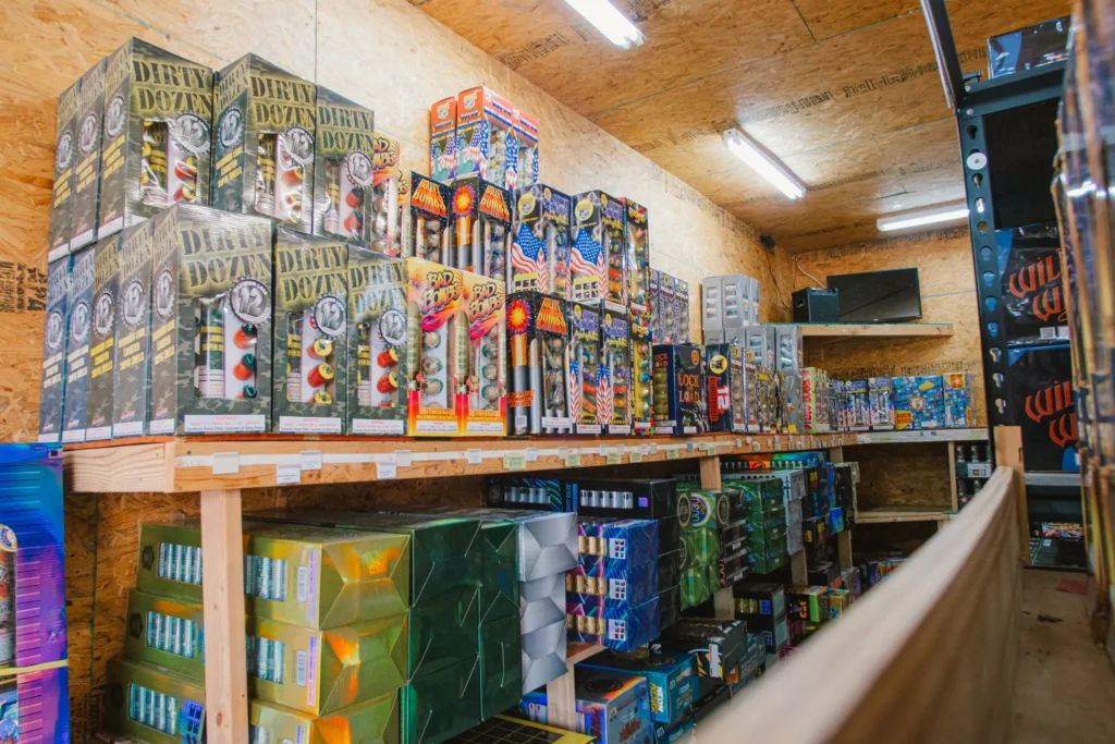 Inside of North Georgia Fireworks with multiple firework products and brands lining the shelves